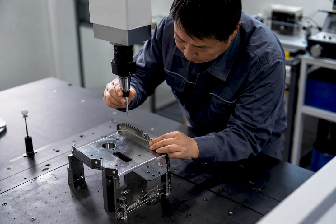 Quality inspector using CMM for first-article inspection